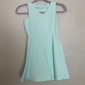 Mint Green Dress with adorable Bow in back. Size 8